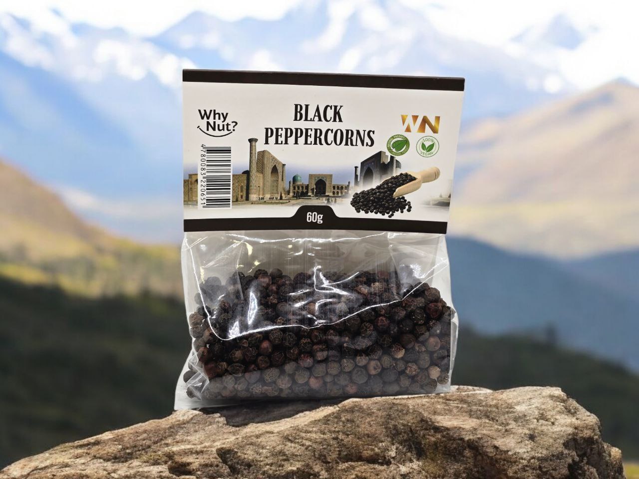 Whole black peppercorns from Nature Pick Market, perfect for enhancing the flavor of your dishes with sharp and spicy notes.